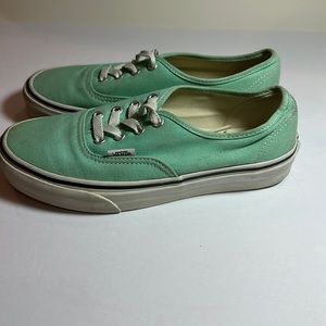 Vans off the wall teal skate sneakers.